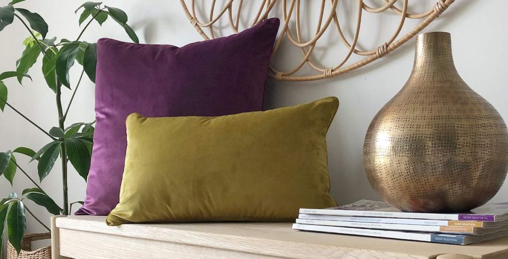 Mustard and purple velvet cushions