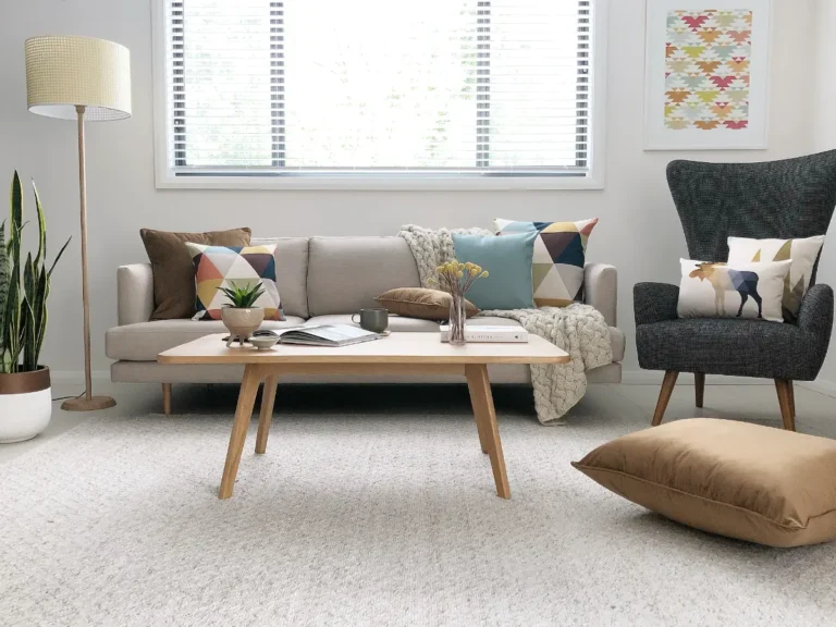 Neutral sofa with two two one cushions arrangement.
