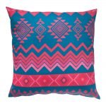 Image of green and pink outdoor cushion cover with geometric design