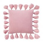 Photo of pink knit cushion with tassels