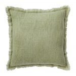 Photo of green cushion made of cotton material