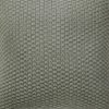 Close up photo of grey cushion cover made of knit material