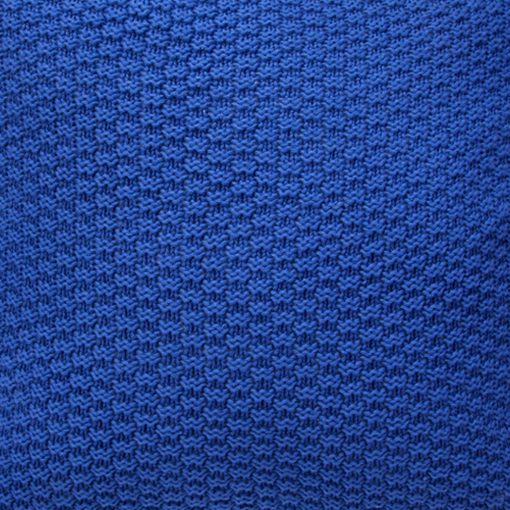 Close up image if knit cushion cover in lapis lazuli blue colour