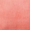 Close up photo of salmon orange indoor cushion cover made of cotton fabric