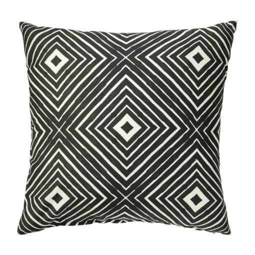 Photo of black and white outdoor cushion cover with geometric tribal print