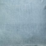 Close up photo of indoor cotton cushion cover of denim blue colour
