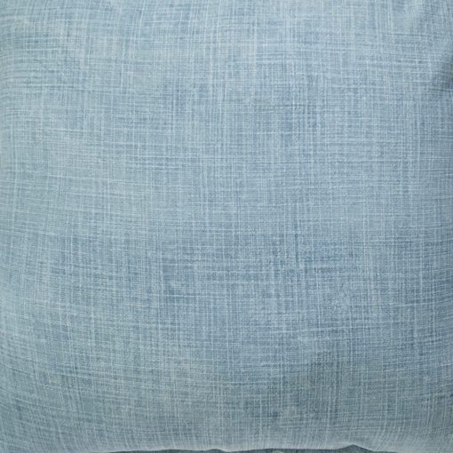 Close up photo of indoor cotton cushion cover of denim blue colour