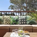 green outdoor cushion covers in outdoor setting