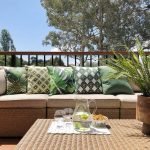 Photo of nature inspired outdoor cushions in outdoor setting