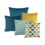 Photo of 5 cushion set in teal and gold colours