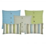 A collection of square and rectangular cushions in cable knit and line patterns