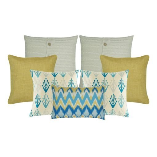 A set of 7 cushions covers with solid, modern floral, cable knit and chevron patterns and in gold and blue colours