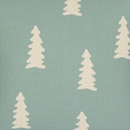 Close up of teal cotton linen cushion cover with pine tree design