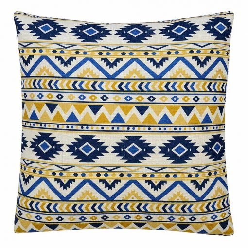 Photo of white cushion cover with blue and yellow tribal zigzag patterns