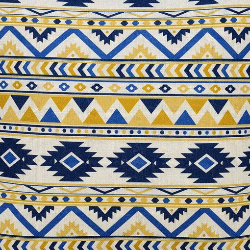 Close up photo of zigzag patterned cushion cover in bright yellow and blue colours