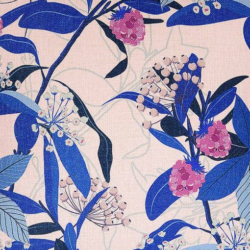 Close up image of pink cotton linen cushion cover with blue leaves