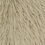 Close up photo of 30cm x 50cm size rectangular fur cushion in ecru colour