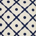 Close up photo of Hamptons-inspired cushion cover with blue lattice design