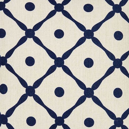 Close up photo of Hamptons-inspired cushion cover with blue lattice design