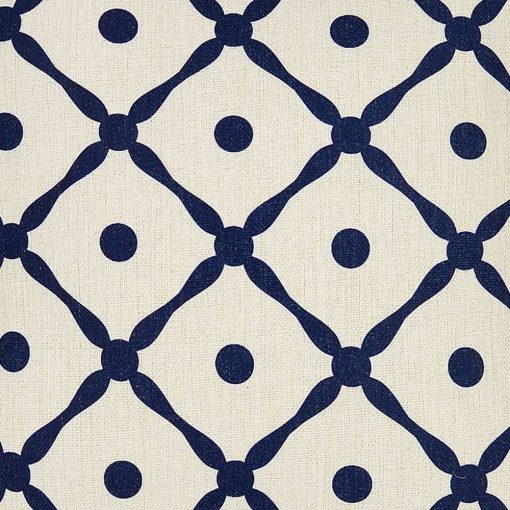 Close up photo of Hamptons-inspired cushion cover with blue lattice design