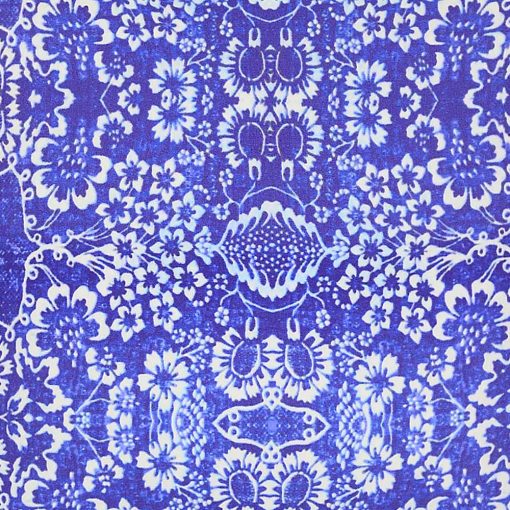 Close up look of blue and white outdoor cushion with floral pattern