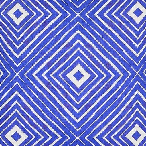 Close up image of blue outdoor cushion in kaleidoscope design