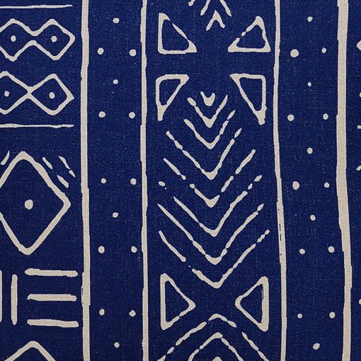 Close up of blue and white rectangular cushion cover with mud cloth design