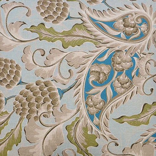 Close up image of pastel blue paisley cushion cover with brown acorn and leaves