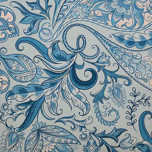 Close up image of elegant teal coloured cushion cover with floral print