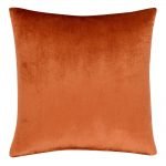Photo of square rust velvet cushion cover