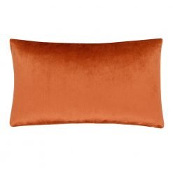 Photo of rust coloured rectangular cushion cover in rectangular shape