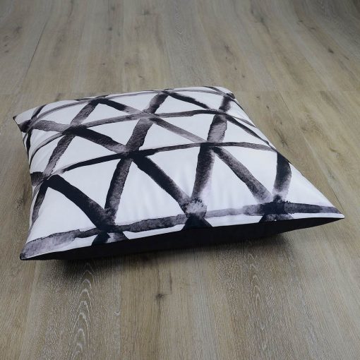 Photo of black and white floor cushion cover in triangle pattern