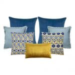 Image of 7 blue and mustard coloured cushion set in Aztec inspired design