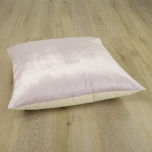 Image of pink floor cushion made of velvet and linen material