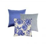Image of 3 blue cushion covers in block and floral design