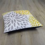 Image of yellow and grey floral floor cushion