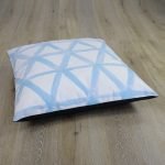 70cm x 70cm pastel blue and white floor cushion with triangles design