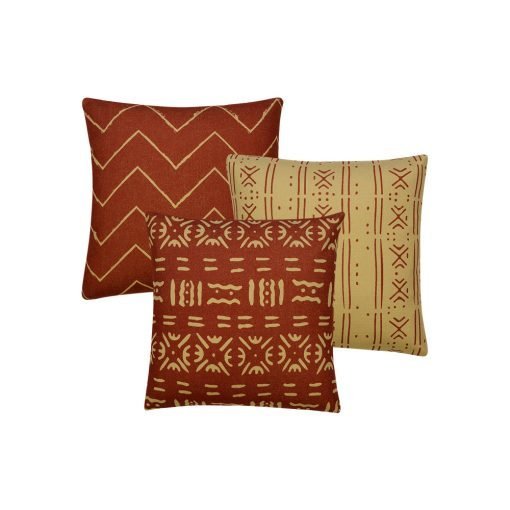 Photo of 3 rust coloured square mud cloth cushions