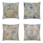 Image of teal and gold coloured paisley cushion covers with floral design