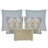 Photo of blue and oyster coloured paisley cushions in square and rectangular shapes