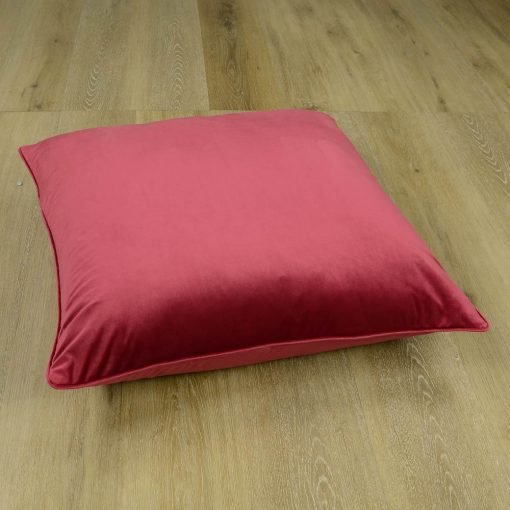 A floor cushion made of velvet fabric, magenta pink colour, 70 x 70