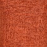 Zoomed in image of a cotton linen cushion in burnt orange colour