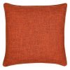 Photo of square cushion cover in burnt orange colour