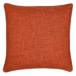 Photo of square cushion cover in burnt orange colour