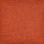 Close up image of burnt orange coloured cushion cover