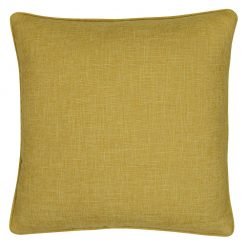 Photo of yellow cushion made of linen material