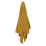 Super soft and cozy couch throw made of 100% pure cotton in mustard colour