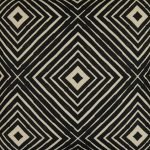 Close up image of black outdoor cushion cover with kaleidoscope pattern