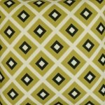 Close up image of yellow green square cushion cover with tile design