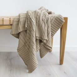 Gorgeous khaki throw blanket that has a delicate texture